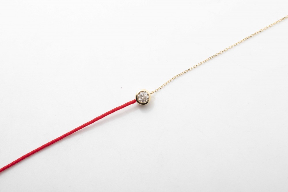 Pulsera con brillantes (cadena y pita)