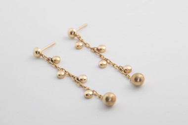 Par de aretes oro largos