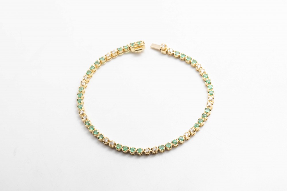 Pulsera tennis con esmeraldas y diamatnes