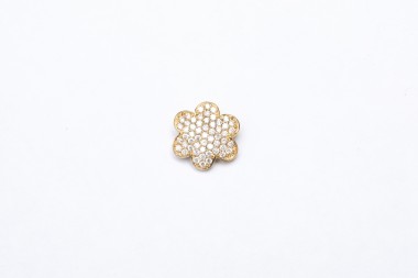 Dije de flor con brillantes